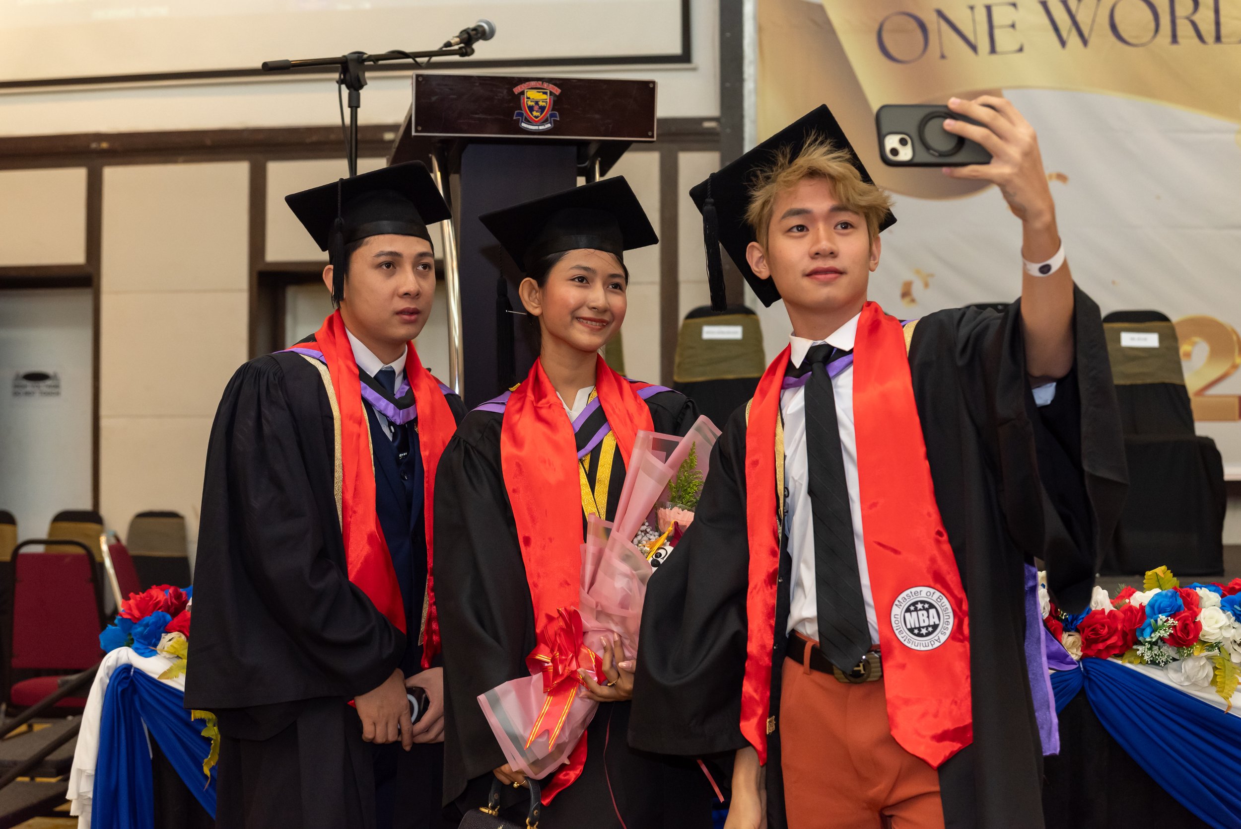 Graduates taking a selfie